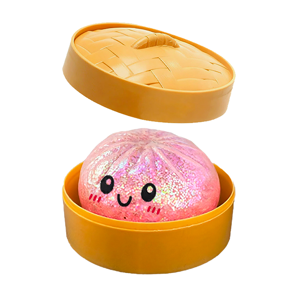 لعبة سكويشي ذهبية اللون على شك - مراجعة Kids Toys Dumplings وسعره
